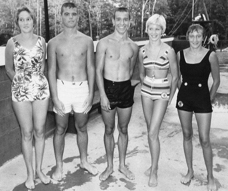 Young Tim O'Brien and friends pose in swimsuits 