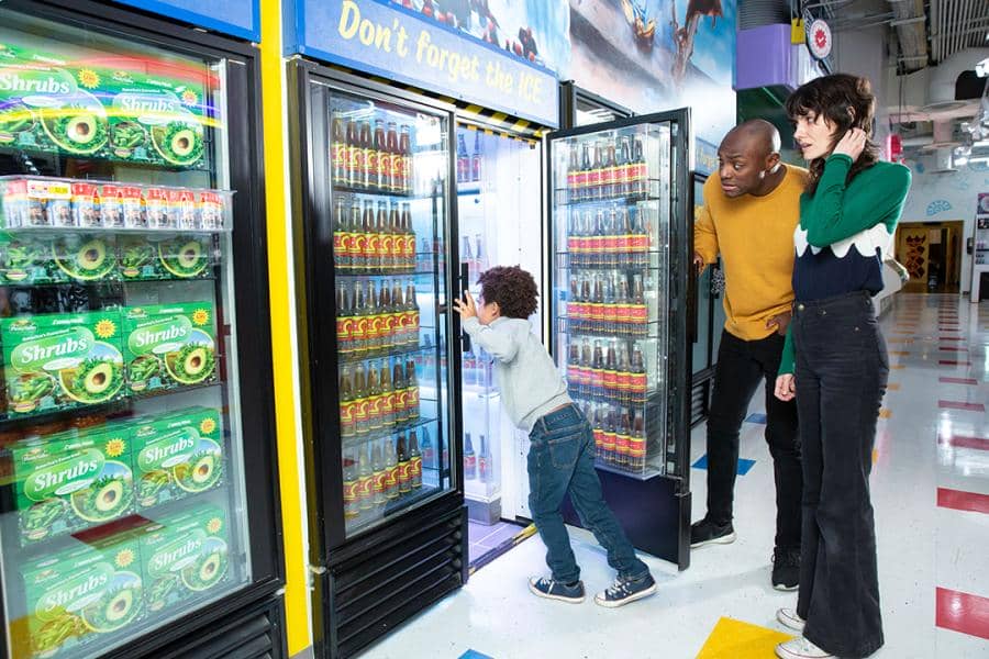 A family enters a portal Meow Wolf Omega Mart in Las Vegas