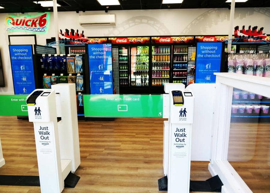 A turnstile scanner, where guests need to scan credit cards to enter inside Quick 6 convenience shops inside Six Flags theme parks