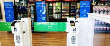 A turnstile scanner, where guests need to scan credit cards to enter inside Quick 6 convenience shops inside Six Flags theme parks