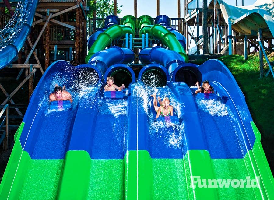 Riders embark on a ride down a slide at Noah's Ark water park.