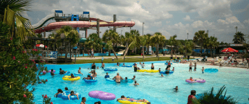 Gulf Islands Waterpark pool under storm clouds.