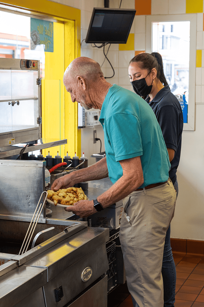 Ken Whiting frying dough 