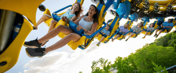 guests riding roller coaster