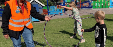 Young boy learns from Hula Hoop Official about Safe Distancing - provided by Sommerland-Sjaelland 